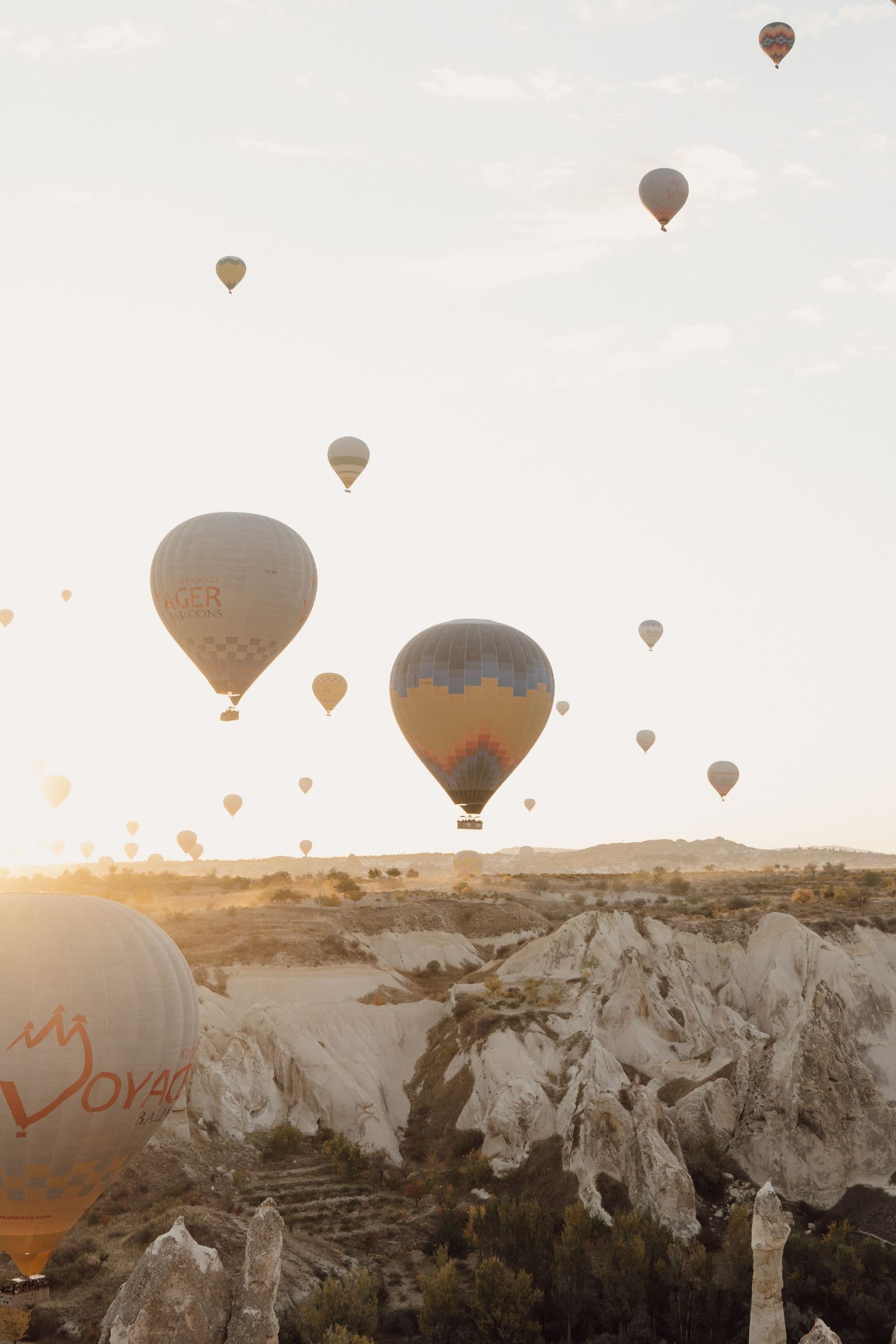 A balloon drifting low over the fairy chimneys